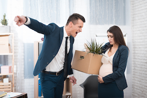 Young,Angry,Chief,Screams,And,Fired,Upset,Pregnant,Girl,With