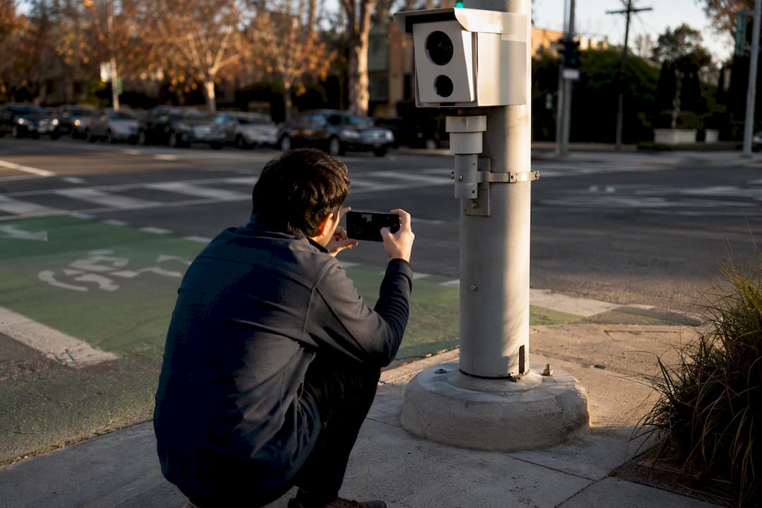 Photographing crash scene camera evidence